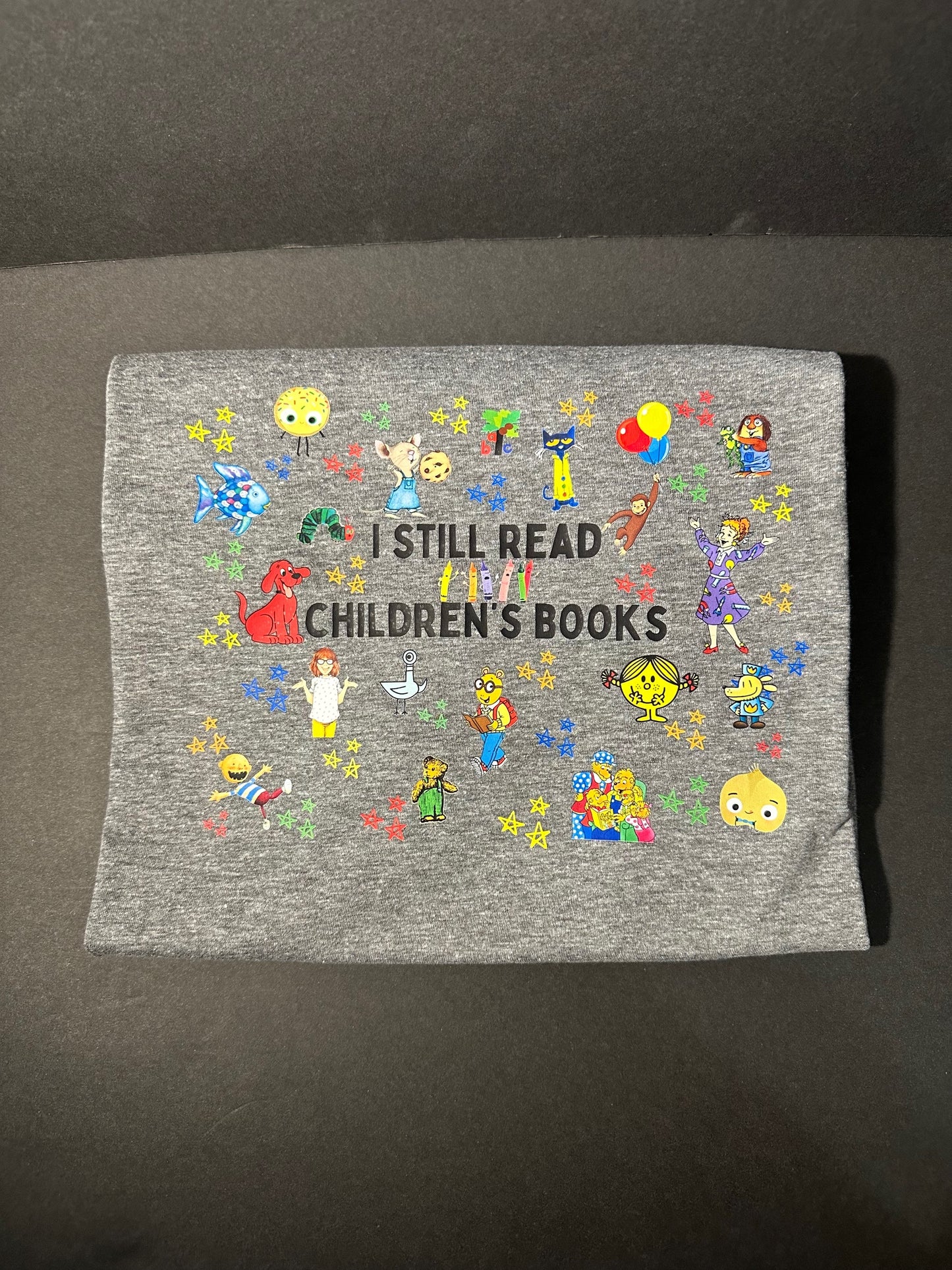 I Still Read Children’s Books Tee image 1